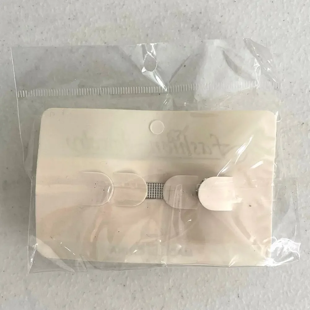 New in package Fashion Jewelry hair clip white pearls/rhinestones